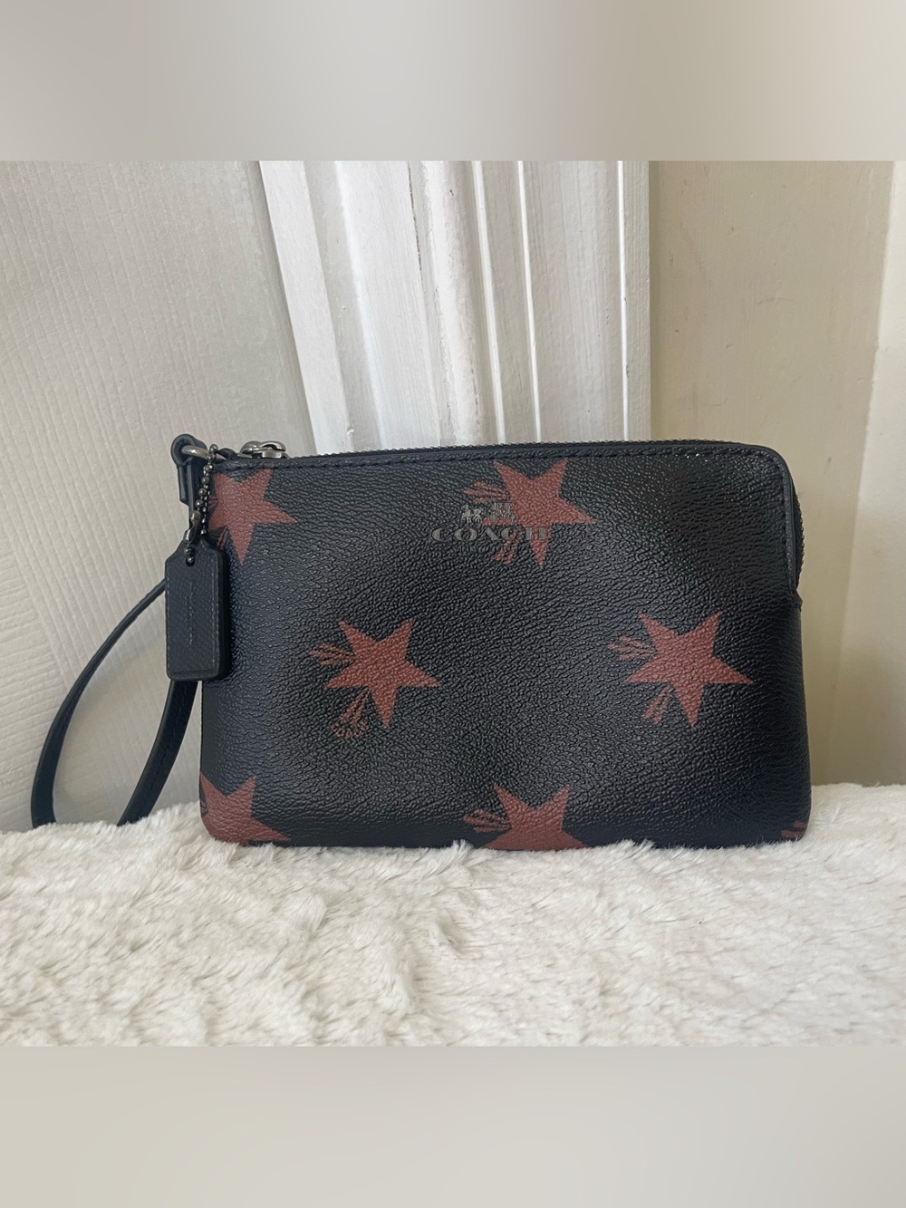Coach Black Leather Wristlet with Brown Star Print